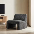 Sillón tapizado de chenilla Amita